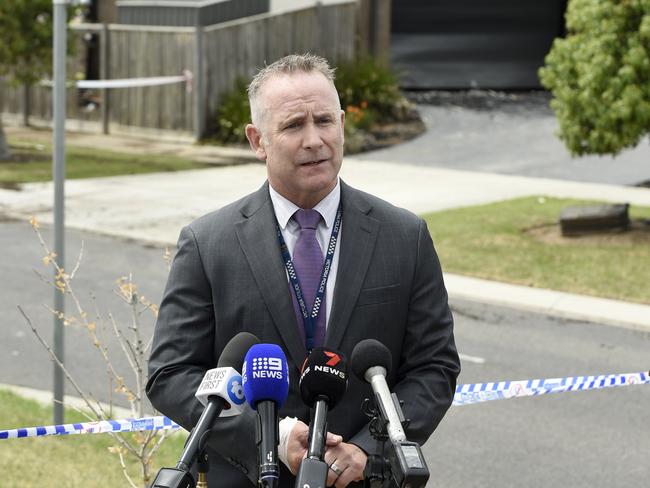 Detective Inspector Chris Murray, of the Arson and Explosives Squad, speaks to the media. Picture: Andrew Henshaw