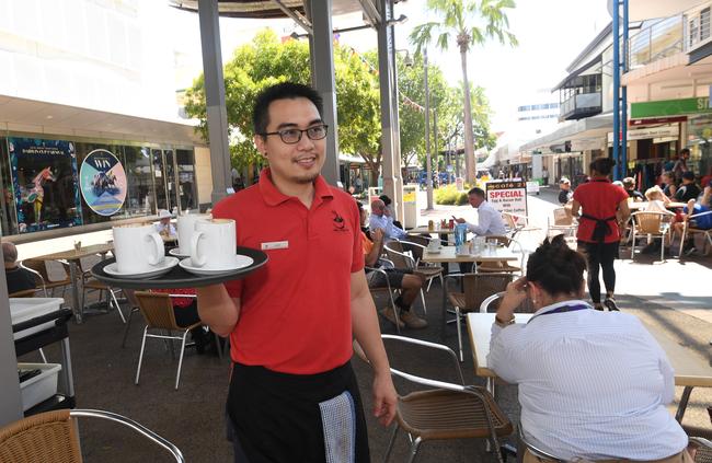 Lord Mayor Kon Vatskalis is approaching council to start free al fresco dining in the mall. Pictured is waiter Ferdinand Lao from Cafe 21.