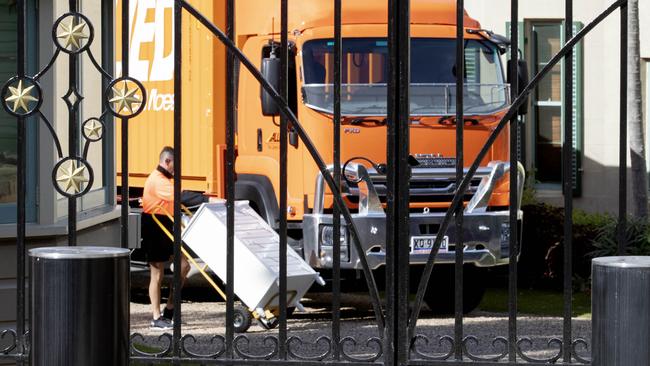 Movers were seen loading a cabinet on to the truck. Picture: NCA NewsWire / Nikki Short