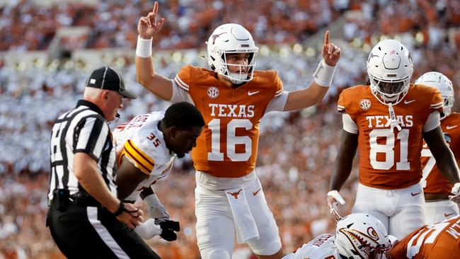 Quarterback Arch Manning reacts after a touchdown against the Warhawks. (Photo by Tim Warner/Getty Images)