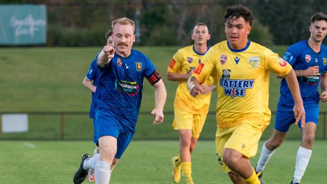 Noosa Lions captain Luke Becconsall and Kawana FC striker Josh Buchanan in action. Picture: Bruce Haggie