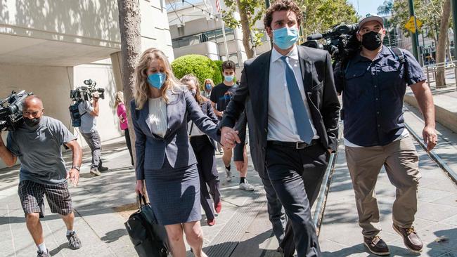 Elizabeth Holmes, founder and former CEO of blood testing and life sciences company Theranos, leaves the courthouse with her husband Billy Evans. Picture: Nick Otto/AFP