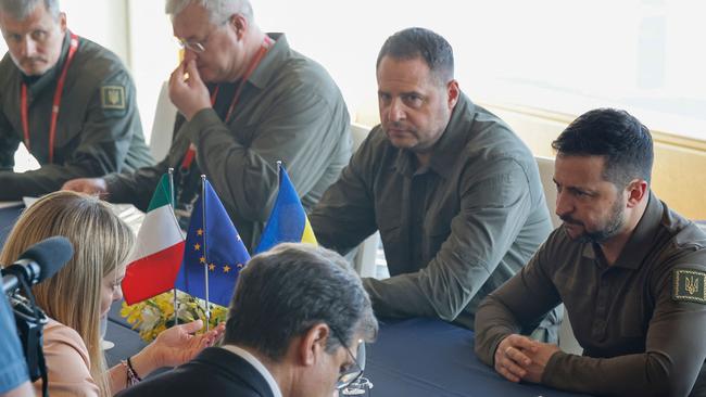 Volodymyr Zelensky speaks with Italy's Prime Minister Giorgia Meloni, left, during their bilateral meeting on the sidelines of the G7. Picture: Pool / AFP