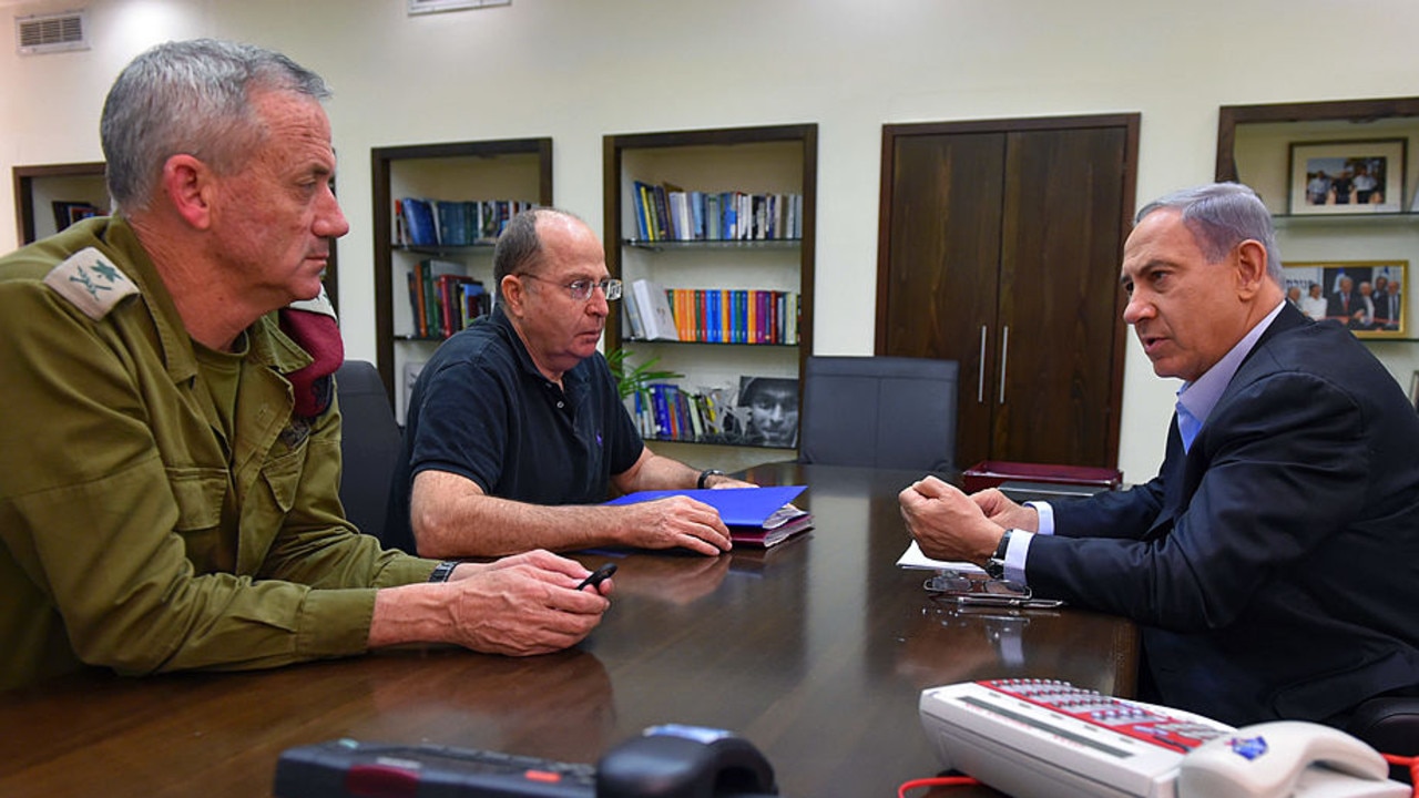 Mr Netanyahu (right) meeting with Mr Ya’alon (centre) and the IDF’s chief of staff Benny Gantz (left) in 2014. Picture: Ariel Harmoni/Getty Images