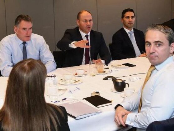 Commonwealth Bank of Australia CEO Matt Comyn (fourth from right) alongside Anna Bligh, the CEO of Australian Banking Association (second from right) during a meeting with Australian Federal Treasurer Josh Frydenberg (centre) and other banking executives in Sydney on Wednesday. Picture: AAP