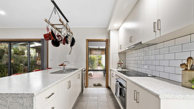 The kitchen has ample storage space.