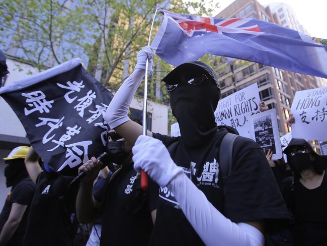 Pro-democracy supporters are seen during a Hong Kong pro-democracy demonstration in Sydney at the end of last year. Picture: AAP