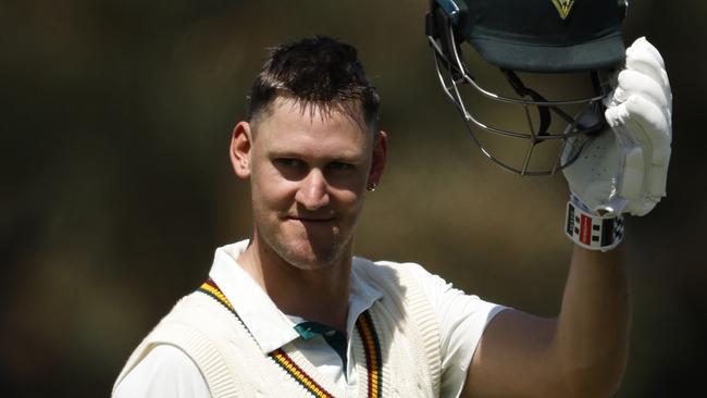 MELBOURNE, AUSTRALIA - OCTOBER 10: Beau Webster of Tasmania acknowledges his team mates after scoring 100 runs during the Sheffield Shield match between Victoria and Tasmania at CitiPower Centre, on October 10, 2024, in Melbourne, Australia. (Photo by Darrian Traynor/Getty Images)