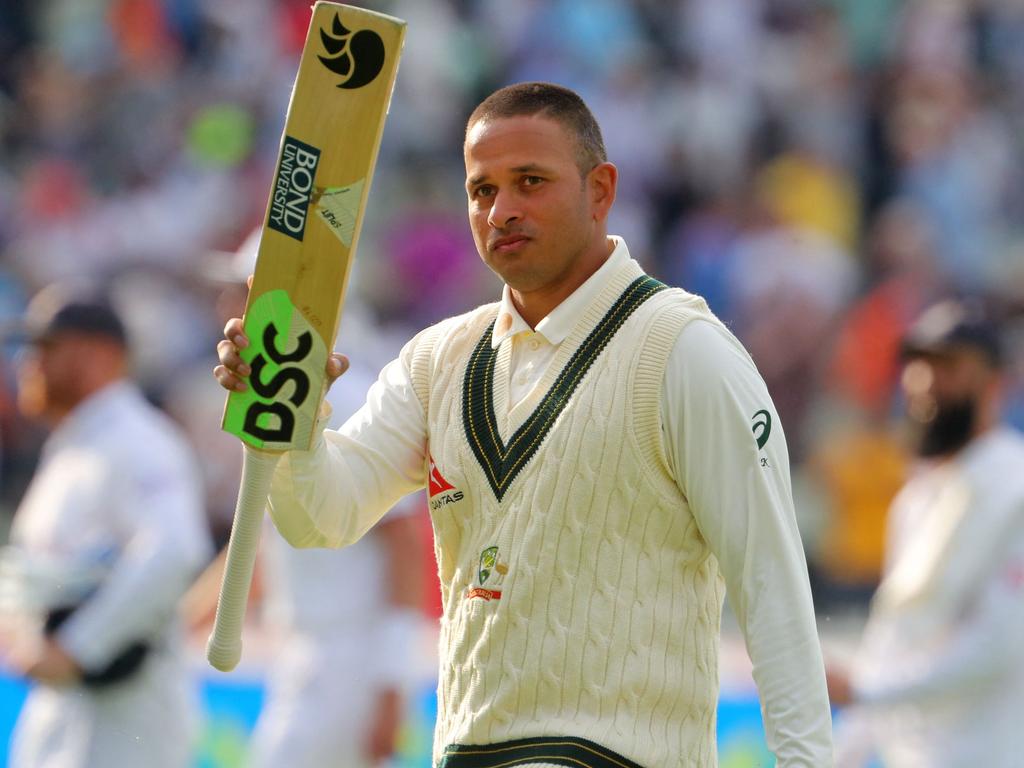 Australia's Usman Khawaja acknowledges the crowd as he leaves the field at Edgbaston unbeaten on 126 after day two of the Ashes. Picture: Geoff Caddick/AFP