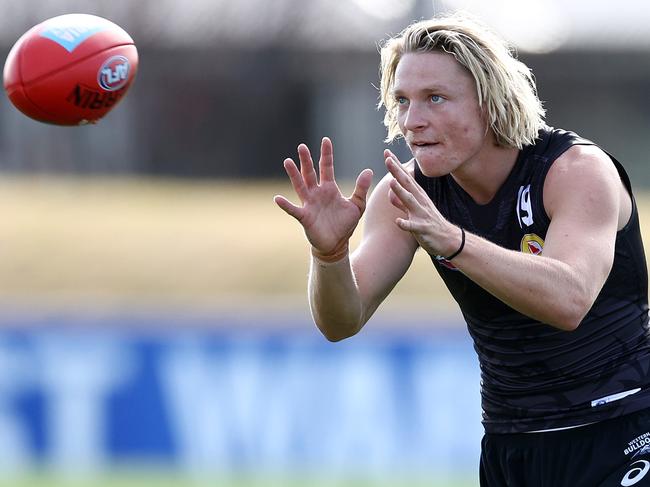 MELBOURNE.  26/02/2022.  AFL. Western Bulldogs training at Whitten Oval.  Bulldog Cody Weightman  during todays training session     . Photo by Michael Klein