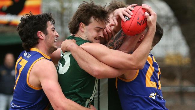 EFL: James Sturtridge of Wantirna South gets tackled. Picture: Hamish Blair