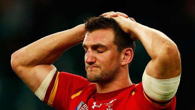 (FILE PHOTO) Sam Warburton has announced his retirement from playing rugby union on July 18, 2018. LONDON, ENGLAND - OCTOBER 17:   Losing Captain Sam Warburton of Wales holds his head in his hands and looks dejected after during the 2015 Rugby World Cup Quarter Final match between South Africa and Wales at Twickenham Stadium on October 17, 2015 in London, United Kingdom.  (Photo by Dan Mullan/Getty Images)