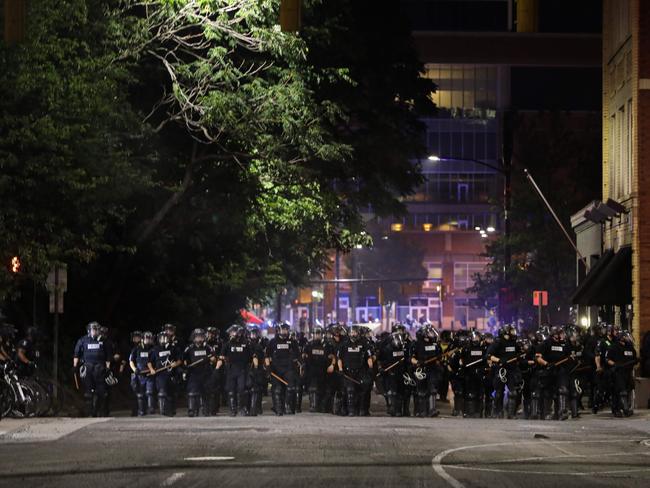 CMPD officers stand in line during a demonstration for the end of police brutality in Charlotte, North Carolina. Picture: AFP