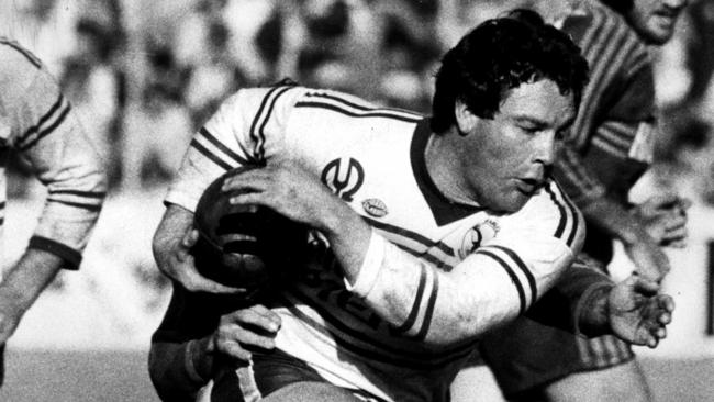 SEPTEMBER 12, 1982: Graham Eadie (ball)shrugs off tackle during Manly v Parramatta first grade major semi-final match at SCG in Sydney, 12/09/82. Pic John Burney.HistoricalRugby League A/CT