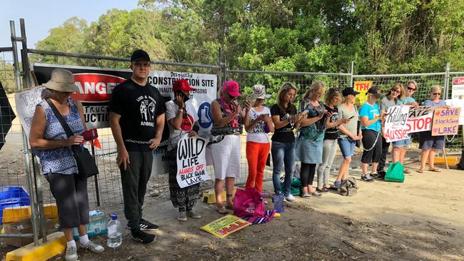 Black Swan Lake supporters chaining themselves to the front gates of the work site. Picture: Paul Weston.