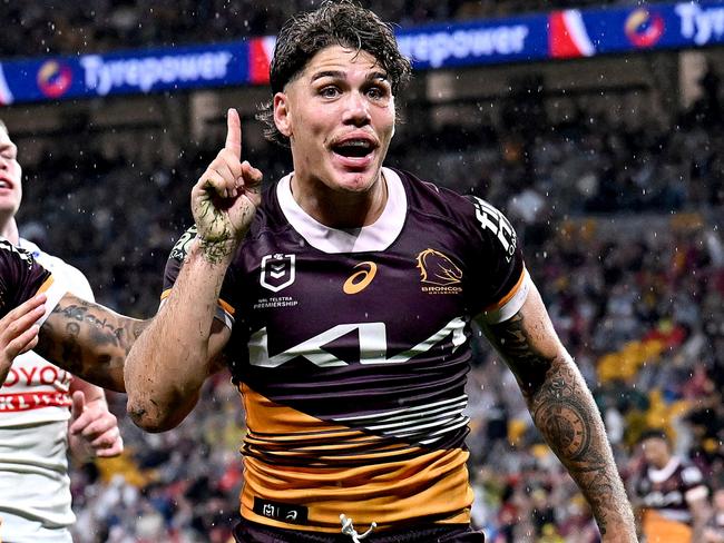 BRISBANE, AUSTRALIA - APRIL 20: Reece Walsh of the Broncos celebrates after scoring a try during the round seven NRL match between the Brisbane Broncos and Canberra Raiders at Suncorp Stadium, on April 20, 2024, in Brisbane, Australia. (Photo by Bradley Kanaris/Getty Images)