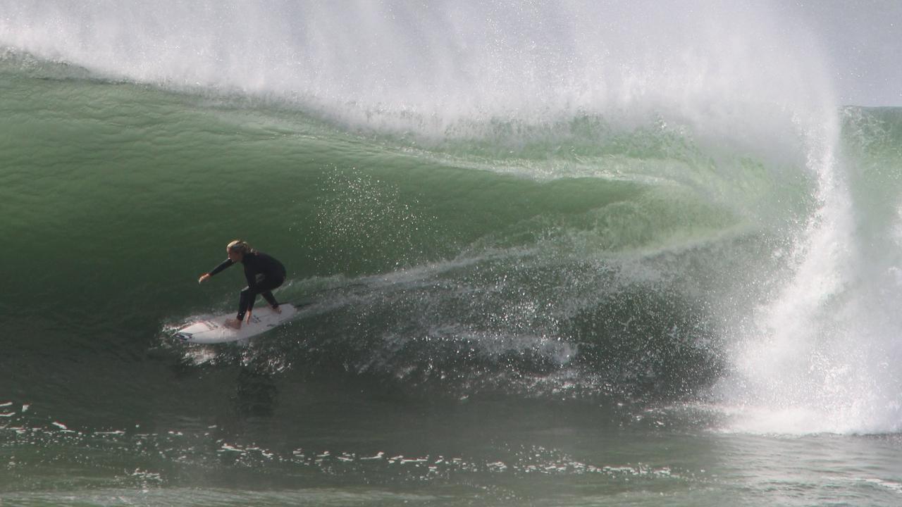 Big seas and sand - erosion at Kirra Point. Picture: Mike Batterham