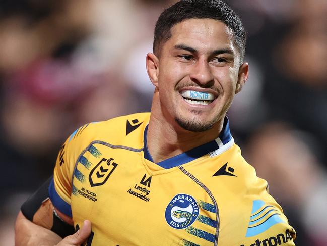 SYDNEY, AUSTRALIA - AUGUST 05: Dylan Brown of the Eels celebrates after scoring a try during the round 21 NRL match between the Manly Sea Eagles and the Parramatta Eels at 4 Pines Park on August 05, 2022, in Sydney, Australia. (Photo by Cameron Spencer/Getty Images)