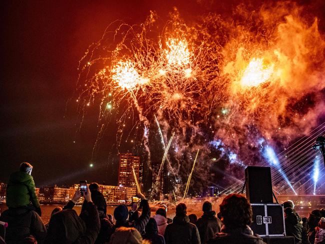 People watch special children's fireworks near the Erasmus Bridge in Rotterdam, The Netherlands. Picture: AFP