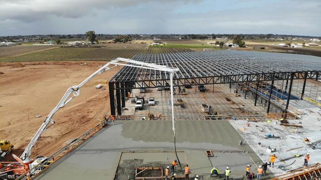 Progress at the Mildura South Regional Sporting Precinct, with the AFL-standard oval, left, and two-storey indoor stadium, right. Picture: Mildura Rural City Council