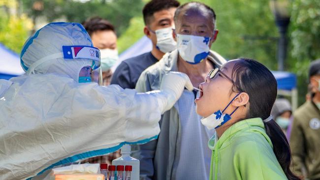 A youngster is tested for Covid-19 in Chengdu, in China's southwestern Sichuan province, this week: Picture: AFP