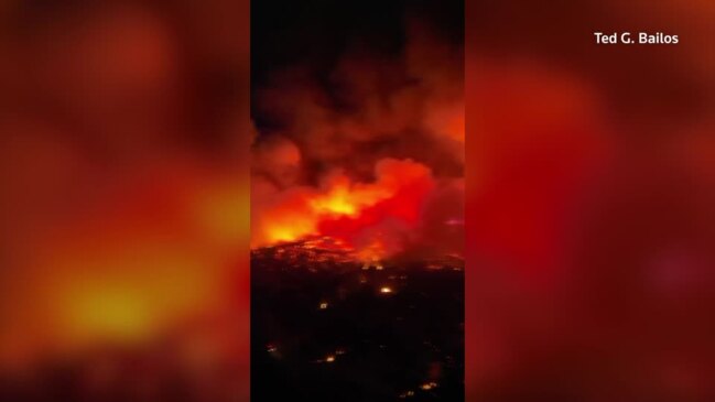 Greek wildfires: Rhodes burns through the night