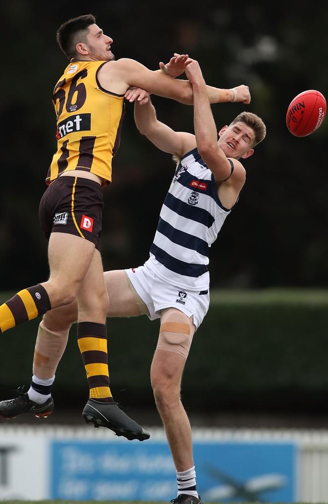 Marc Pittonet of Box Hill and Zac Smith of Geelong compete for the ball on September 9.