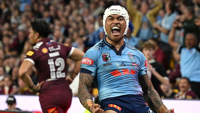Brian To’o celebrates scoring a try in the Blues’ 18-6 State of Origin win over the Maroons at Suncorp Stadium in Brisbane on Wednesday night. Picture: AAP