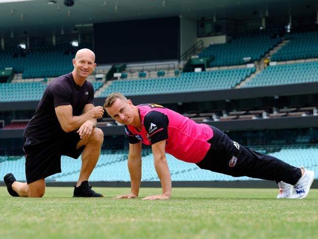 Adam MacDougall puts cricketer Tom Curran through his paces. Picture: Aidan Williams