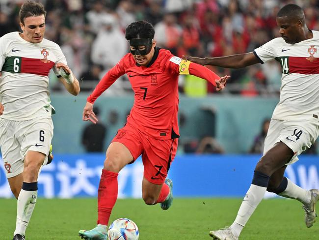 Tottenham captain Heung-min Son drives the ball forward during the 2022 World Cup. Picture: Jung Yeon-je/AFP