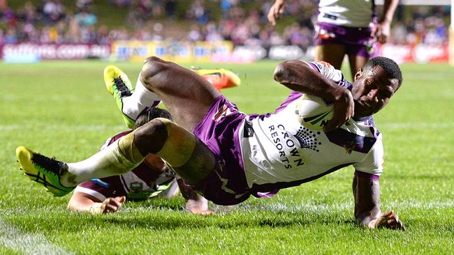 Suliasi Vunivalu scores one of his four tries for the Storm.