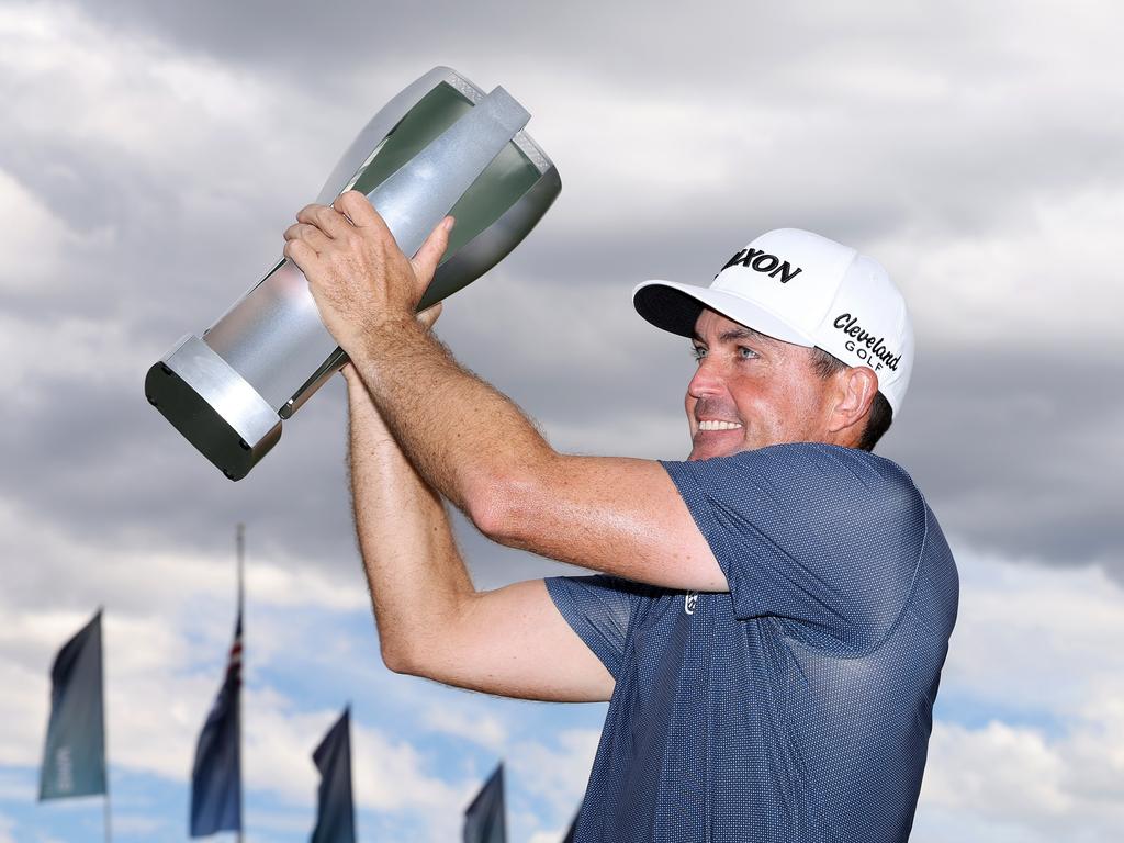 CASTLE ROCK, COLORADO - AUGUST 25: Keegan Bradley of the United States holds up the trophy after winning the BMW Championship at Castle Pines Golf Club on August 25, 2024 in Castle Rock, Colorado. (Photo by Christian Petersen/Getty Images)