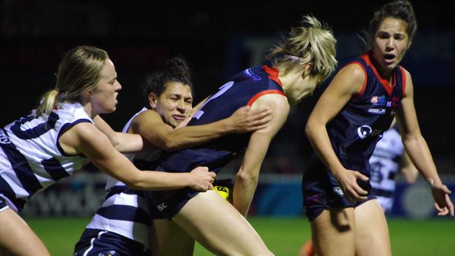 South Adelaide's Czenya Cavouras (front) tackles Norwood's Monique Hollick during their SANFLW semi-final clash at Norwood Oval. Picture: John Emery