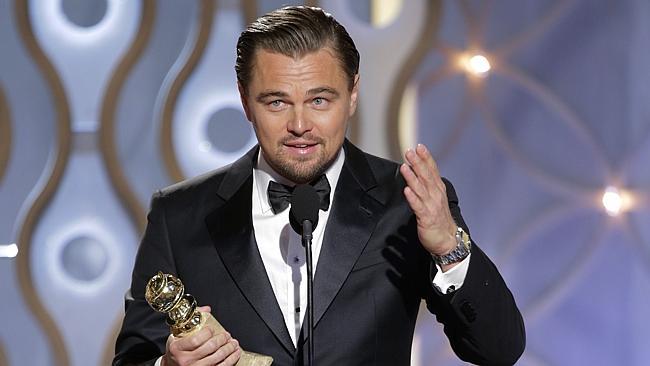 Leonardo DiCaprio accepting the award for best actor in a motion picture comedy for his role in "The Wolf of Wall Street" during the 71st annual Golden Globe Awards.