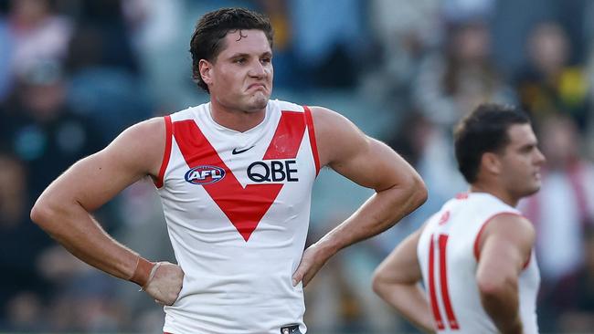 MELBOURNE, AUSTRALIA - MARCH 31: Hayden McLean of the Swans looks dejected after a loss during the 2024 AFL Round 03 match between the Richmond Tigers and the Sydney Swans at the Melbourne Cricket Ground on March 31, 2024 in Melbourne, Australia. (Photo by Michael Willson/AFL Photos via Getty Images)