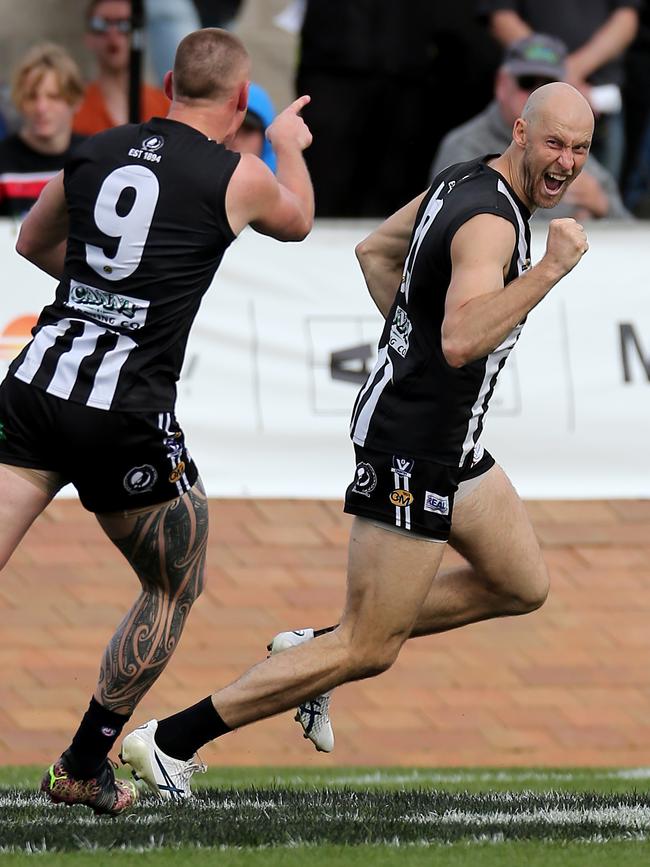 Wangaratta star Callum Moore and coach Ben Reid in the grand final last year. Picture: Yuri Kouzmin