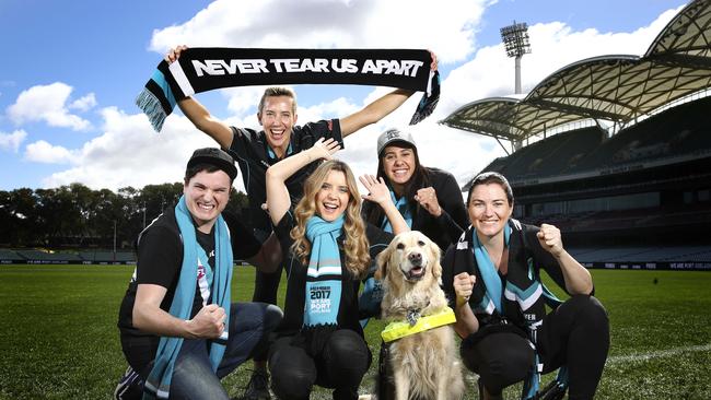 PEOPLE POWER: Port ambassadors together before tonight’s match against West Coast at the Adelaide Oval. From left, Matt Tarrant, Louise Bawden, Rachael Leahcar with guide dog Ella, Taliqua Clancy and Anna Meares. Picture: Sarah Reed