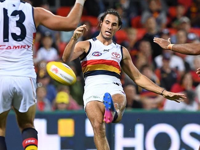 Crows player Troy Menzel kicks a goal  during the Round 5 AFL match between the Gold Coast Suns and the Adelaide Crows at Metricon Stadium in Carrara on the Gold Coast, Saturday, April 22, 2017. (AAP Image/Dave Hunt) NO ARCHIVING, EDITORIAL USE ONLY