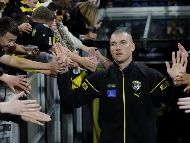 NCA. MELBOURNE, AUSTRALIA. August 24,   2024. AFL Round 24. Richmond vs Gold Coast Suns at the MCG.   Richmonds Dustin Martin  comes out onto the MCG for his lap of honour   . Pic: Michael Klein
