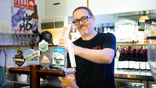 Sue's Bar and Grill owner Chris Venderley pours a beer. Picture: Dominika Lis