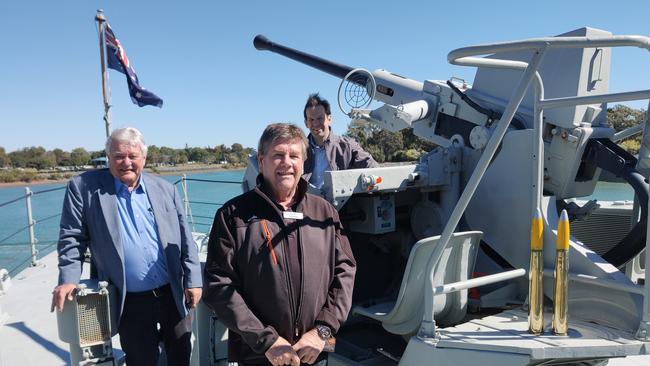 Flynn MP Ken O'Dowd, LNP candidate Ron Harding and Senator Matt Canavan near the 40/60 Bofors general purpose gun on the HMAS Gladstone.