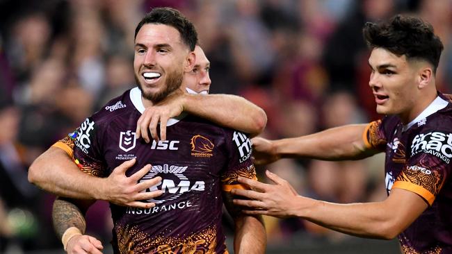 Darius Boyd (left) celebrates scoring against the Warriors. Picture: AAP