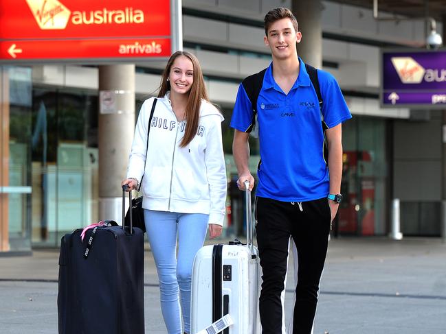 Brooke Hoffmann and Connor Roduner arrive at the Brisbane airport from Cairns.  Case study of someone who has arrived on a flight.Thursday June 4, 2020. (AAP image, John Gass)