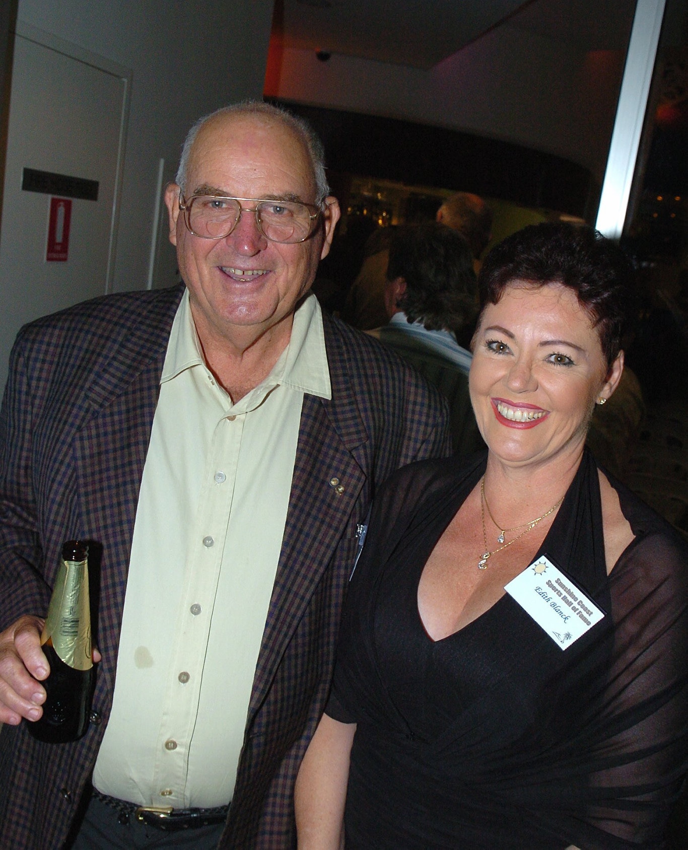 24/11/04 137880e John Blanck received a certificate of merit in the Sunshine Coast Sports Hall of Fame and was congratulated by his wife Edith. Photo: Barry Leddicoat.