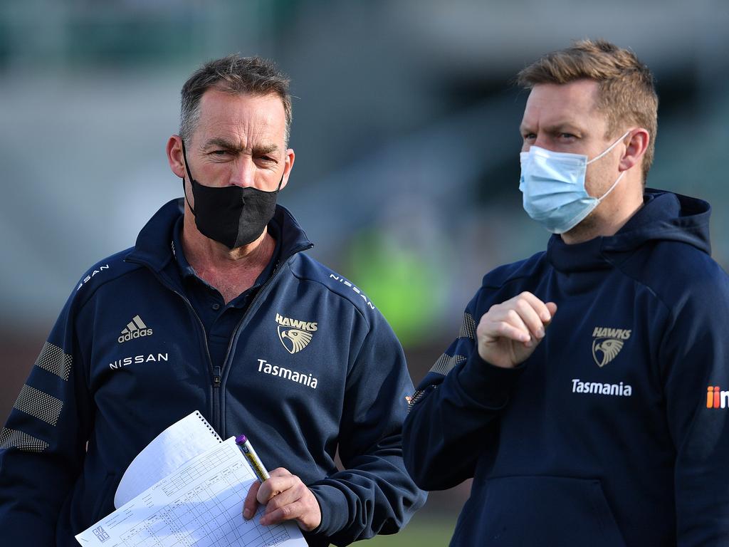 Alastair Clarkson and Sam Mitchell. Steve Bell/AFL Photos/via Getty Images)