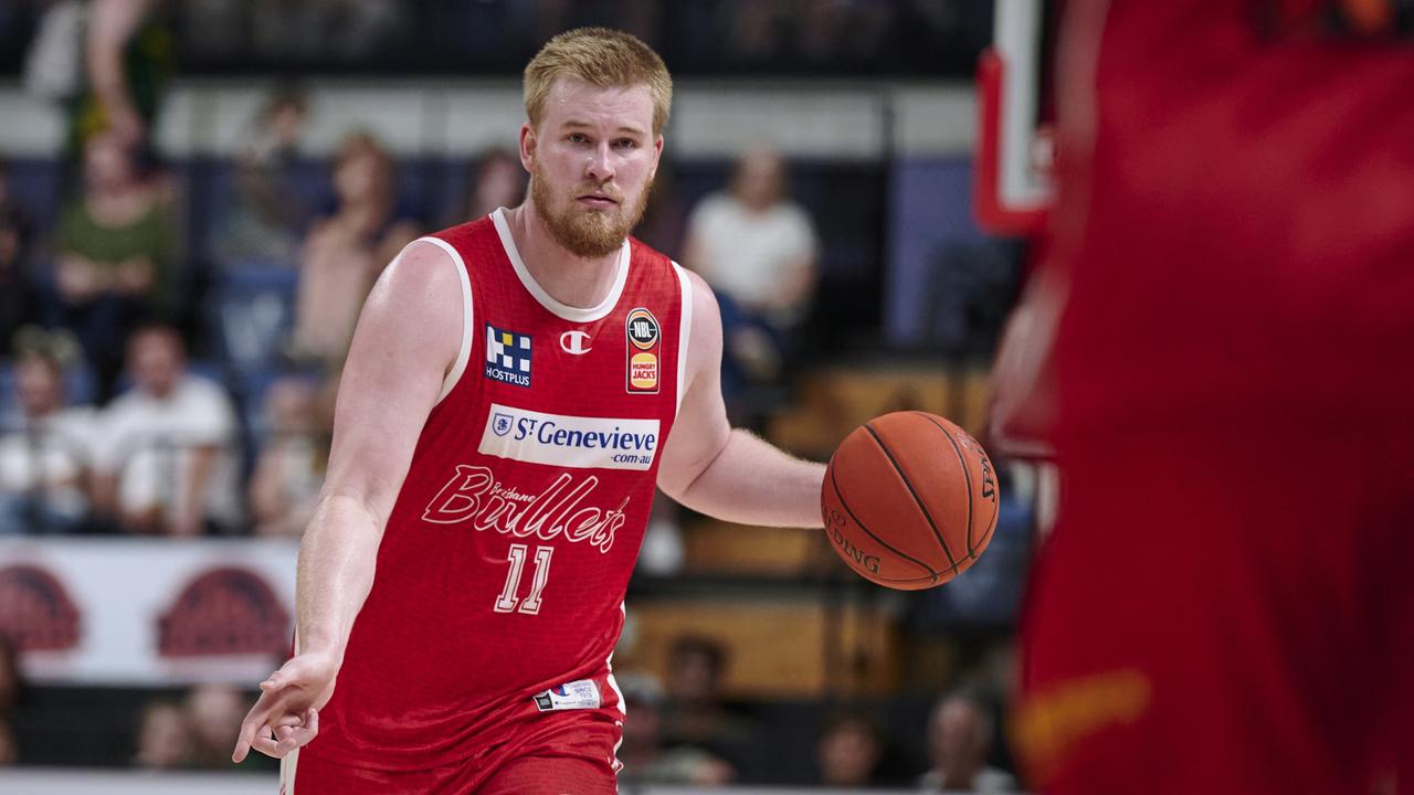 Harry Froling of the Bullets controls the ball during the round 16 NBL match between Illawarra Hawks and Brisbane Bullets at WIN Entertainment Centre, on January 21, 2023, in Wollongong, Australia. (Photo by Brett Hemmings/Getty Images)