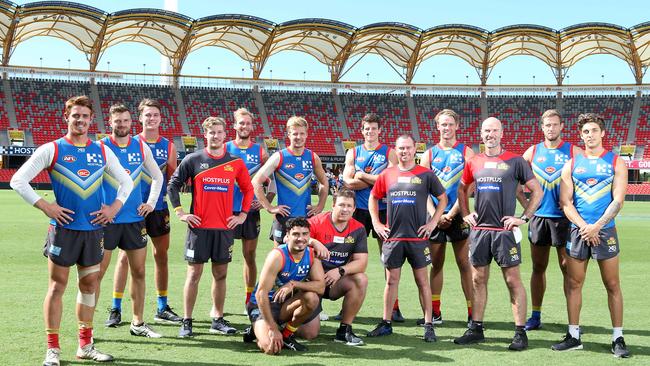 THE SA CONNECTION: The Suns' South Australian contingent, from left, Jez McLennan, Jordan Murdoch, Charlie Ballard, Harrison Wigg, Jack Hombsch, Izak Rankine, George Horlin-Smith, Stuart Dew, Chris Burgess, Tate Kaesler, Jack Lukosius, Josh Francou, Sam Day and Sean Lemmens at Metricon Stadium. Picture: RICHARD GOSLING.