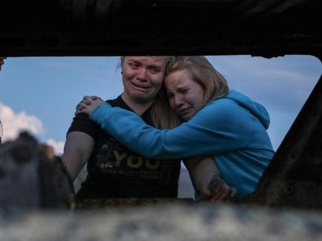 Surviving members of the LeBaron family were in tears as they visited the scene of the crime. Picture: AFP