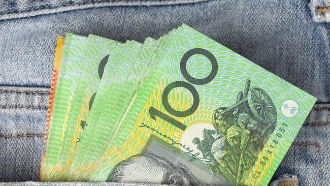 Australian 100 dollar notes in jeans pocket. money, wealthy, rich generic