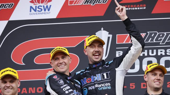 Lee Holdsworth celebrating alongside Chaz Mostert after winning the Bathurst 1000 in 2021. Picture: Tim Hunter.